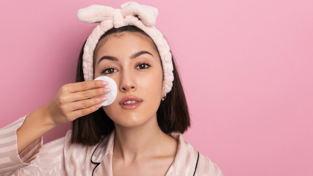 Girl removing makeup