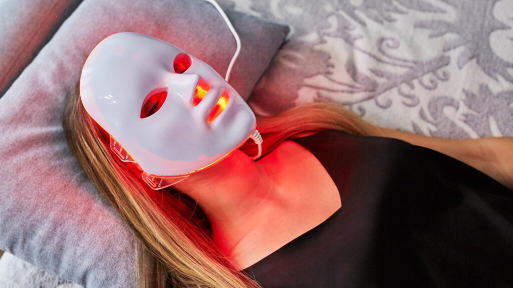 Lady doing too much red therapy on her face