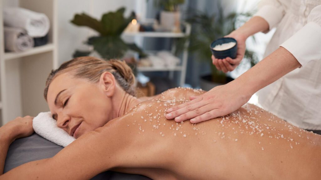 woman exfoliating her body